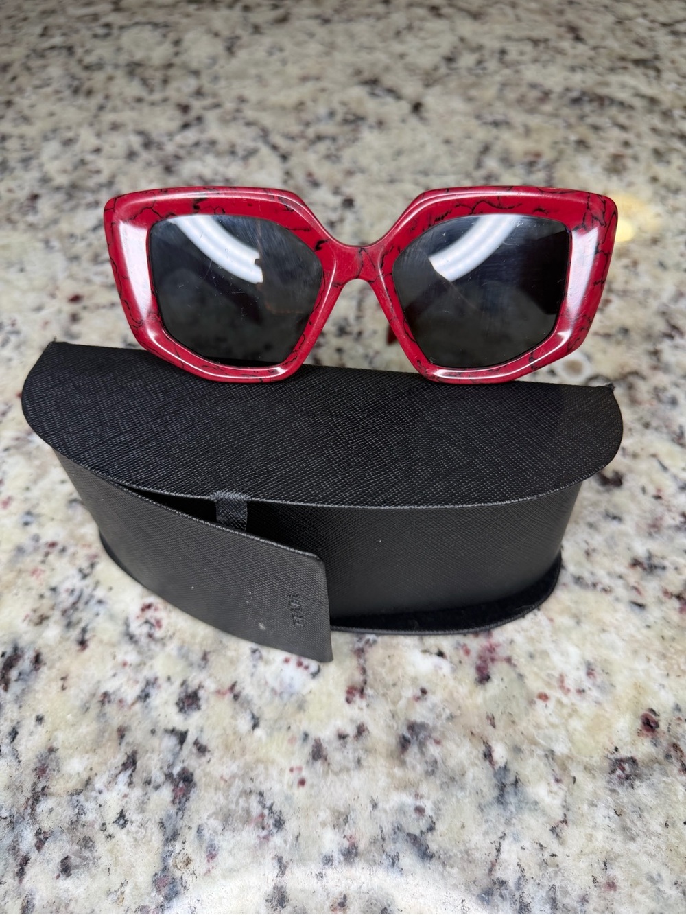 Prada Red Cat-Eye Sunglasses with Black Lenses